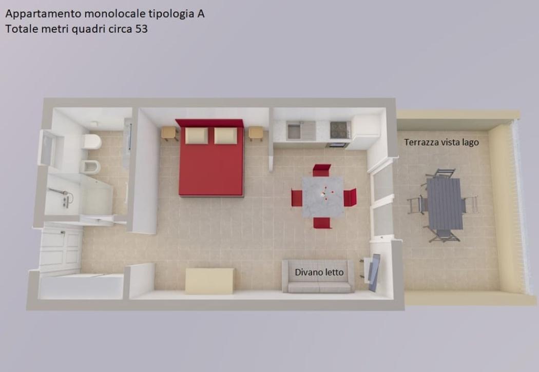 Studio avec terrasse vue lac, cuisine, salle de bain et coin nuit.